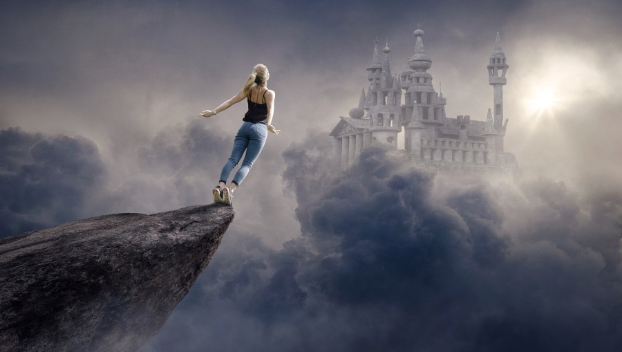 Woman taking a leap of faith off a cliff toward her dream castle.